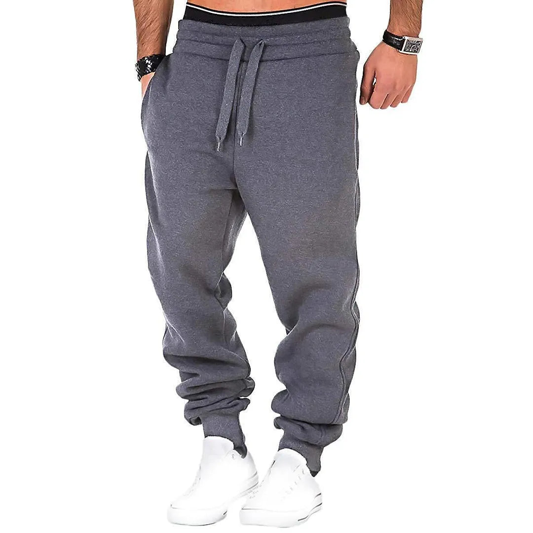 Men's sweatpants jogging trousers with drawstring and elastic waistband in solid color