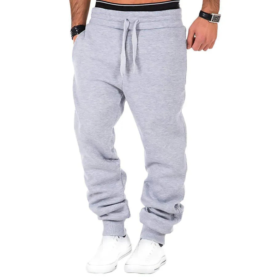 Men's sweatpants jogging trousers with drawstring and elastic waistband in solid color