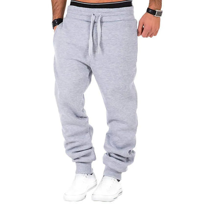 Men's sweatpants jogging trousers with drawstring and elastic waistband in solid color