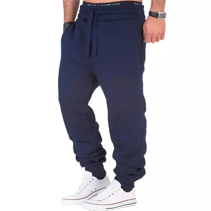Men's sweatpants jogging trousers with drawstring and elastic waistband in solid color