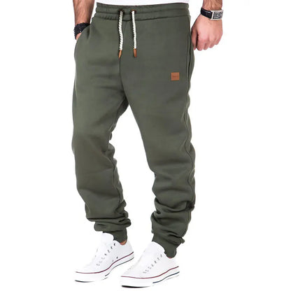 Plain-colored jogging trousers with drawstring waist for men