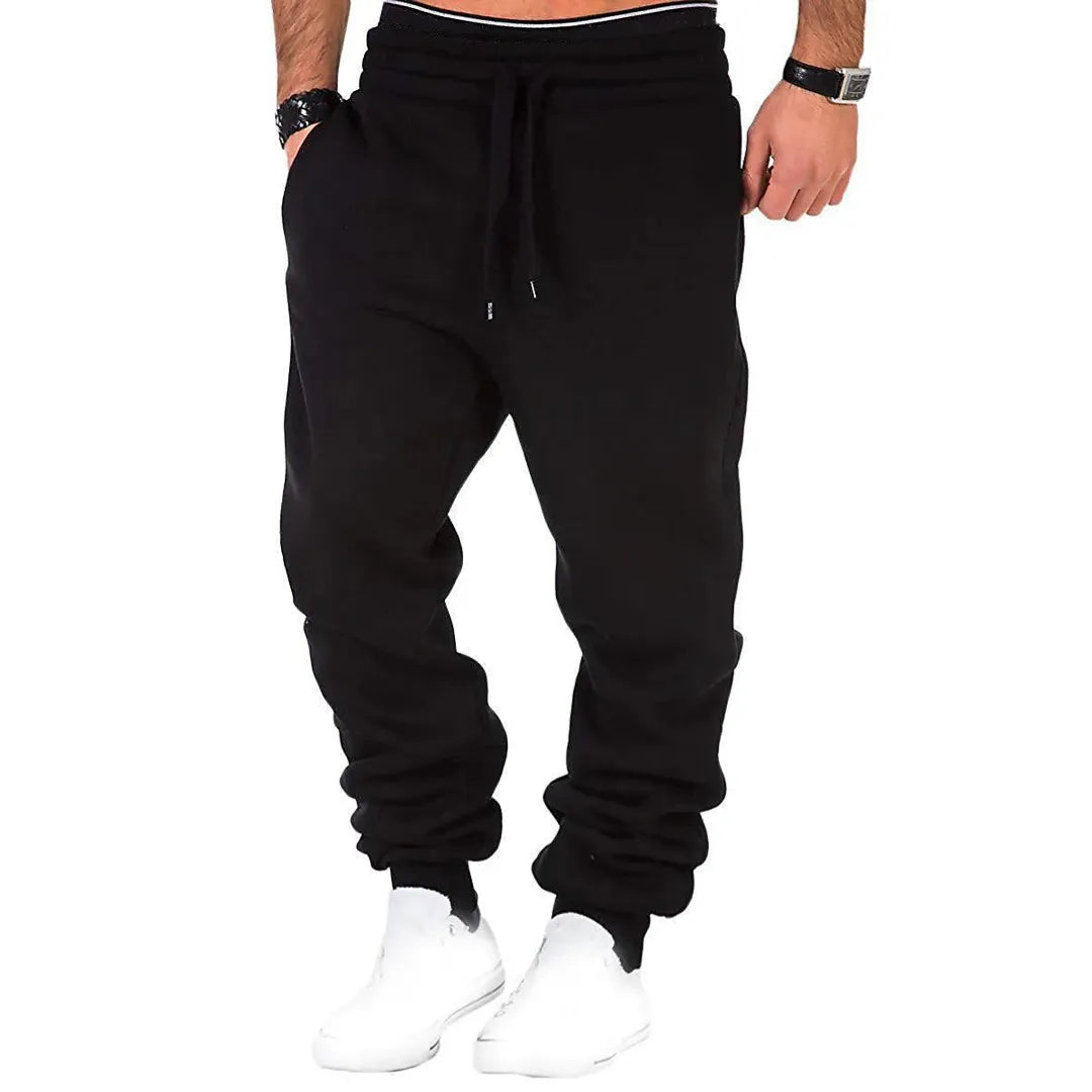 Men's sweatpants jogging trousers with drawstring and elastic waistband in solid color
