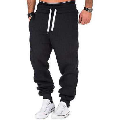 Men's sweatpants jogging trousers with drawstring and elastic waistband in solid color