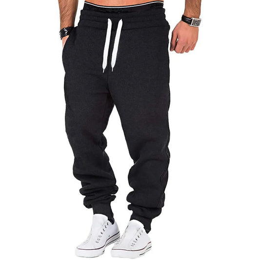 Men's sweatpants jogging trousers with drawstring and elastic waistband in solid color